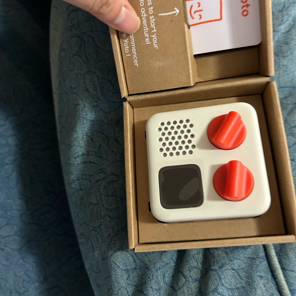 Yoto mini player with 1 starter card and 1 charger